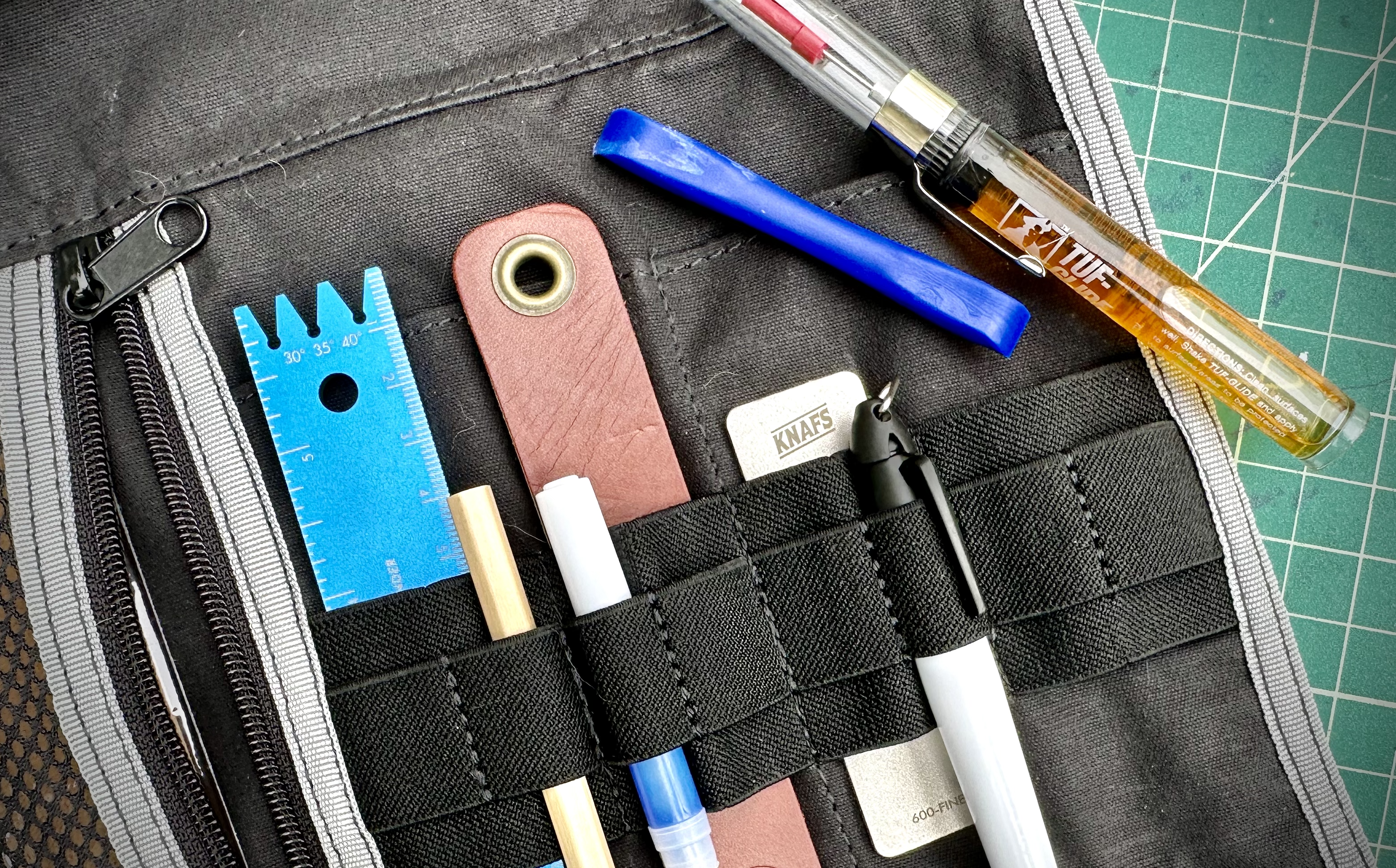 The Knafs Loaded Burrito is your one stop shop for all the tools you need to maintain your knife.