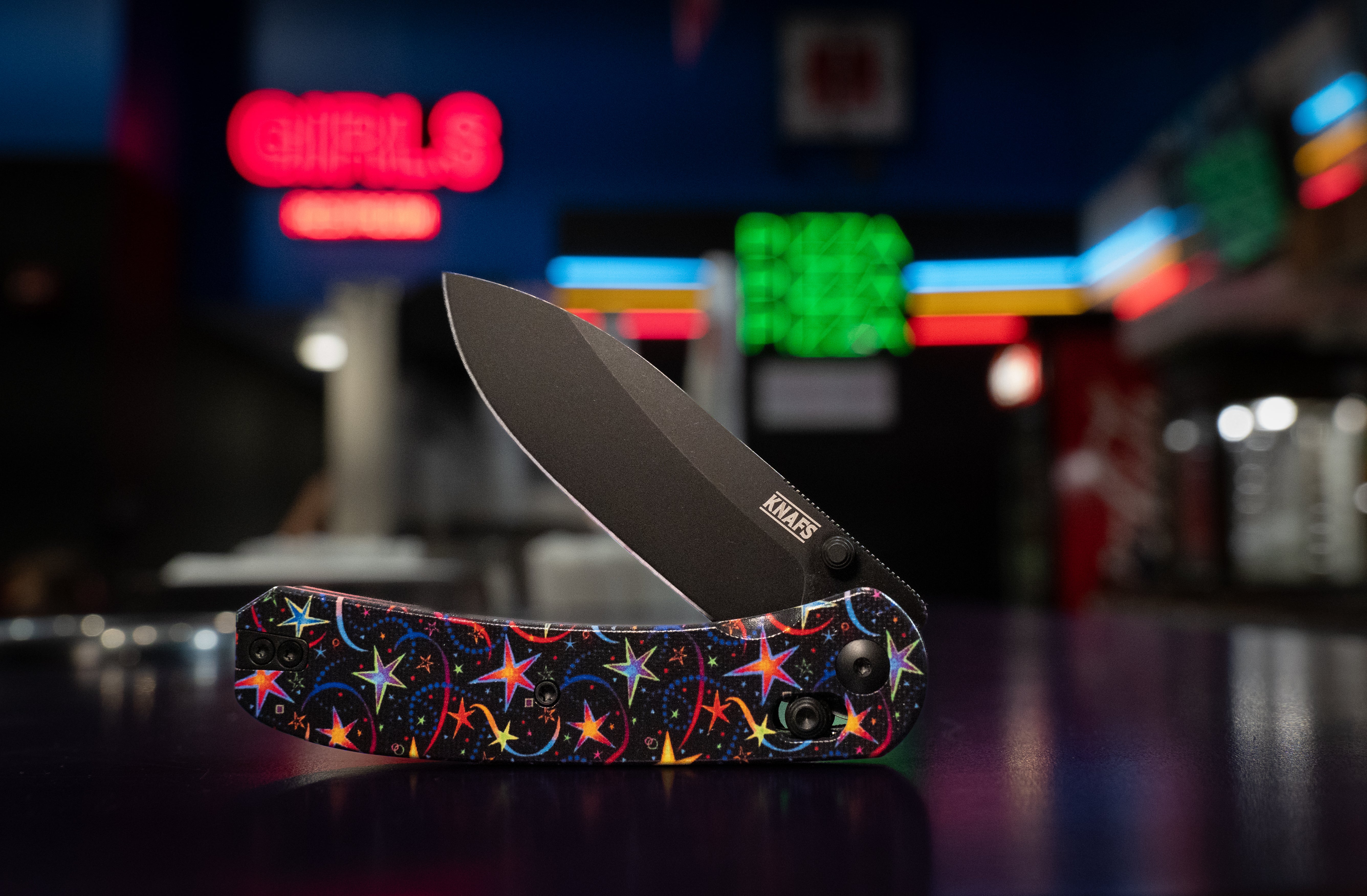 folding knife with star decoration