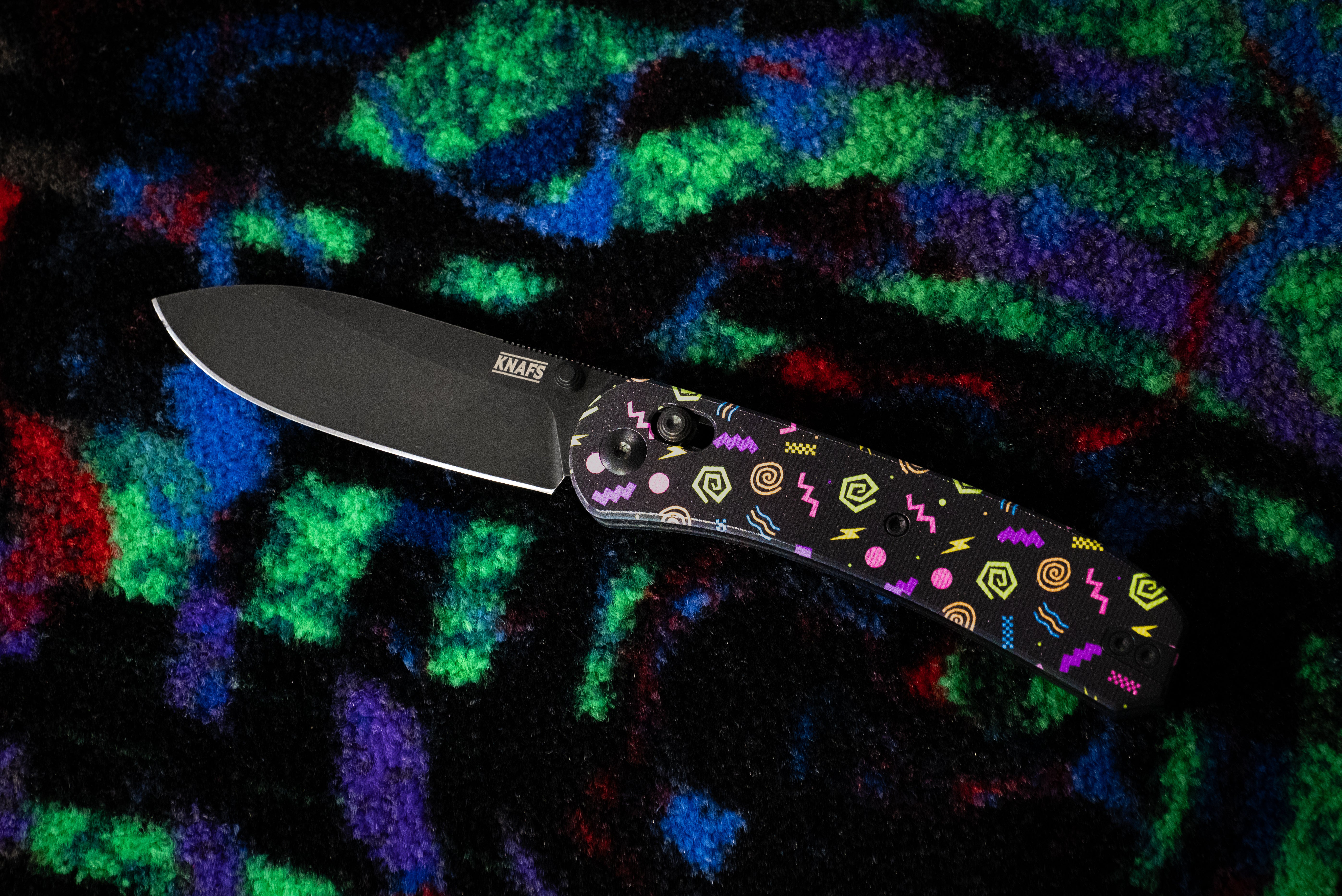 folding knife with 90s style decorations