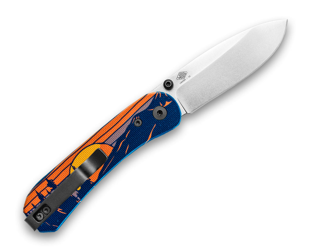 Knafs Lander 1 Pocket knife with Timberline G10 scales, opened back side with a D2 silver stone washed blade, lying flat on a white background at a 45 degree angle 