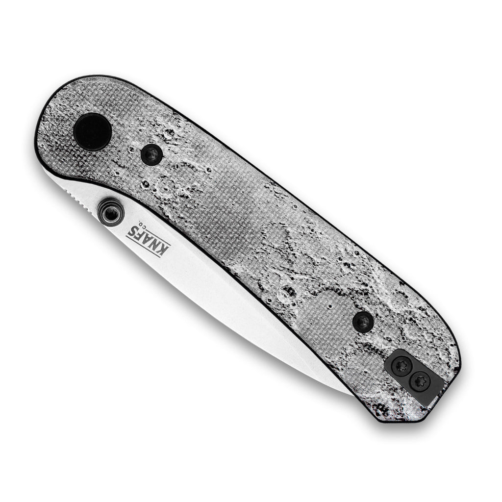 Closed front side of a Knafs Lander 1 Pocket Knife with a Lunar Surface G10 handle and a Stonewashed D2 drop point blade