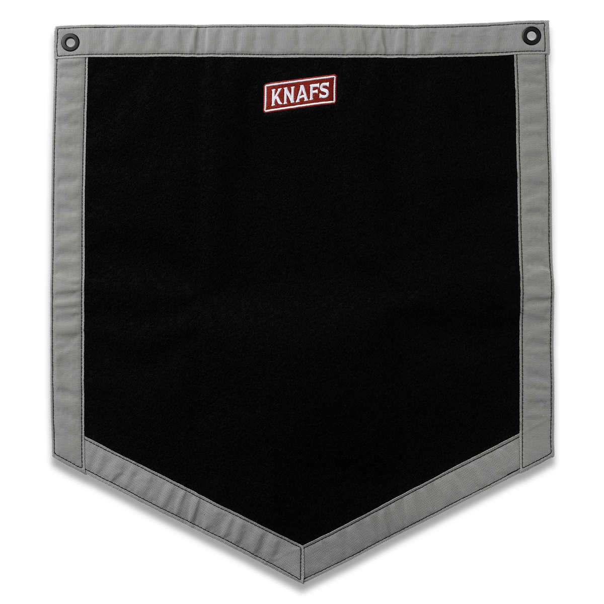 A black and gray KNAFS canvas patch pocket with metal grommets on the top corners, shown flat against a white background.